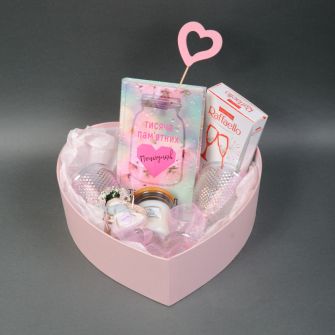 Gift set "Transparent hint" book "A Thousand Memorable Kisses", glasses, candies, candle