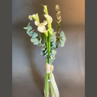 Bouquet of mourning callas and eucalyptus