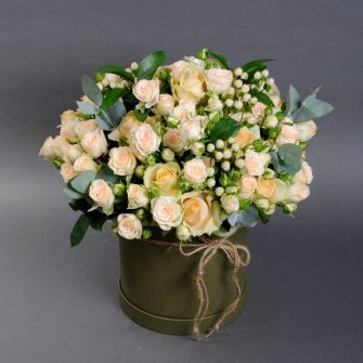 Composition with Peach Avalanche and Elena roses