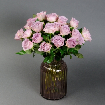 25 Memory Lane roses in a vase