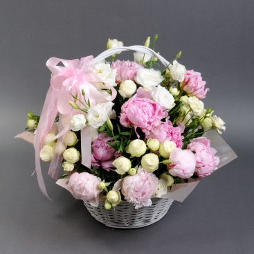 Summer basket of peonies and roses