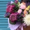 Arrangement in a basket with chrysanthemums and tulips - Photo 3