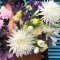 Arrangement in a basket with chrysanthemums and tulips - Photo 2