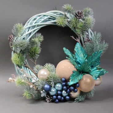 Wreath with New Year's toys and pine cones