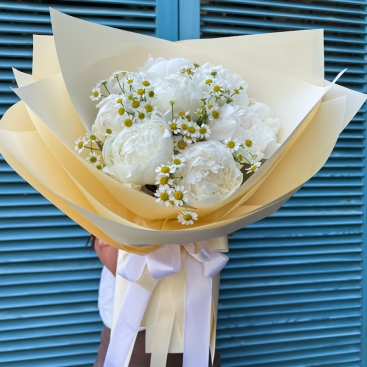 Bouquet with peonies and tanacetum